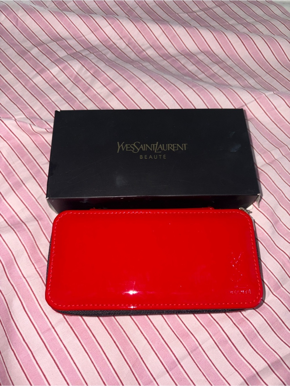 Yves Saint Laurent Red cosmetics bag with brushes